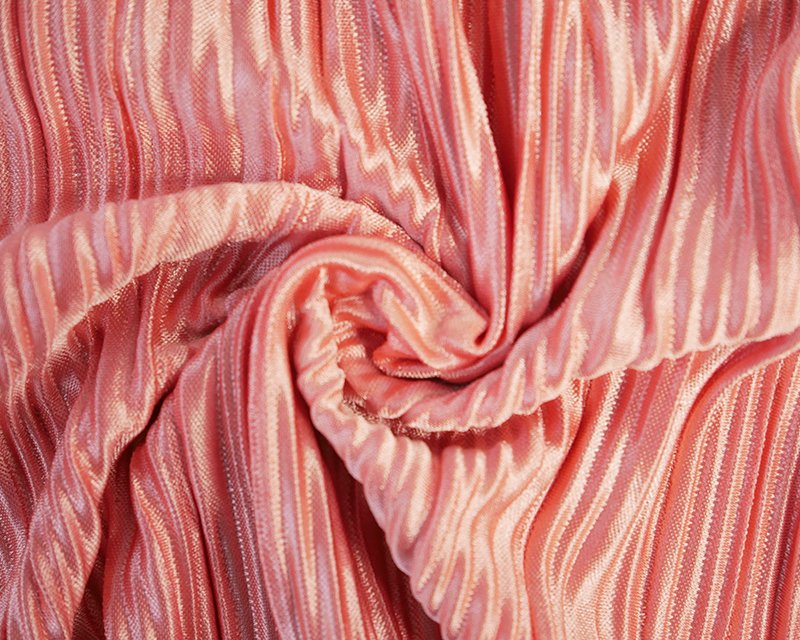 57" Pleated Jersey. Coral or Silver Sold per half meter