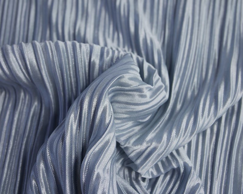 57" Pleated Jersey. Coral or Silver Sold per half meter