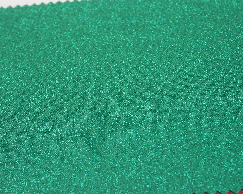 57" wide Stardust Sparkle Glitter textured Cotton, green, pink & Blue. Sold per HALF meter